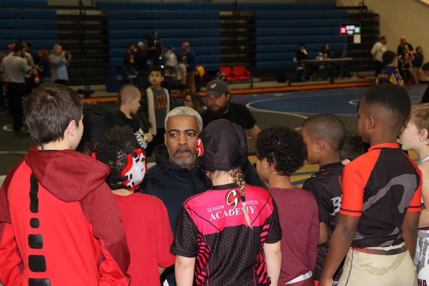 Coach G talking to kids before Michael Gay Battle for the Belt Tournament